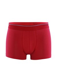 Boxer da uomo rossi con elastico in vita e un discreto logo sul lato destro su uno sfondo bianco.