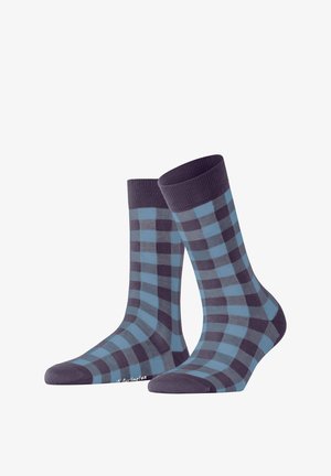 Chaussettes pour hommes avec un motif à carreaux bleu et gris foncé, dotées d'un bord côtelé et d'un orteil renforcé, fabriquées à partir d'un matériau textile doux.