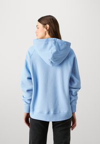 Tommy Hilfiger VARSITY HOODIE - Felpa - vessel blue
