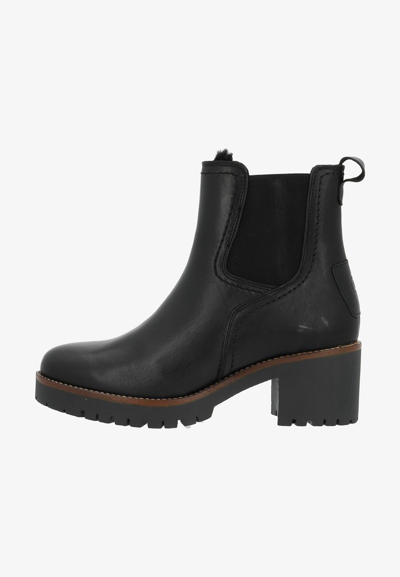 Bottine en cuir noir avec panneaux latéraux élastiques, languette de tirage, talon bloc épais et semelle à crampons avec détail de bordure marron.