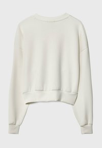 Witte, cropped sweatshirt met lange mouwen, ronde halslijn en ribgebreide manchetten. Gladde textuur zonder zichtbare naden of patronen.