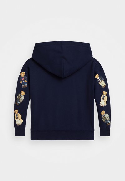 Sweatshirt azul marinho com motivos de ursos nas mangas, confeccionado em tecido macio. Inclui capuz com cordão e punhos canelados.