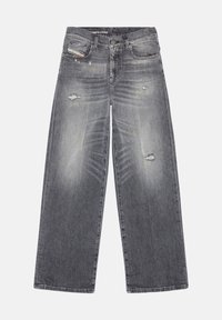 Valkoiset farkut leveillä lahkeilla haalistuneessa mustassa värissä, joissa on kuluneita kohtia, hienovaraista kulutusta ja perinteinen viisi-taskuinen muotoilu metalliosilla.