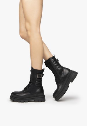 Platform ankle boots - nero