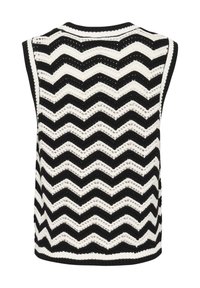 Gilet sans manches en tricot noir et blanc avec un motif en zigzag, un col et un ourlet côtelés, et un design en tissage ouvert texturé.