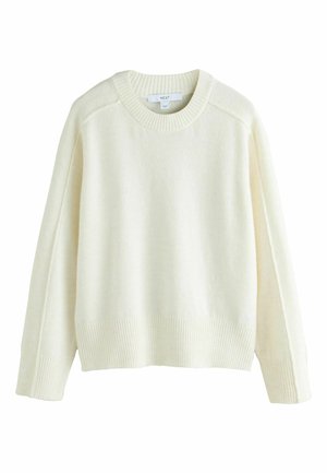 Cremefarbenes langärmliges Strickoberteil mit gerippten Bündchen, Saum und Rundhalsausschnitt, auf einem weißen Hintergrund präsentiert.