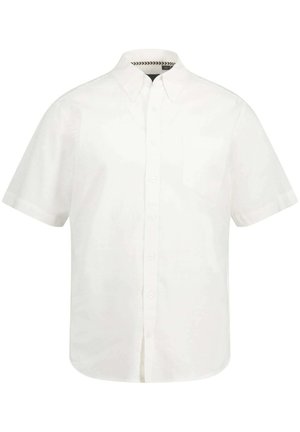 Camicia bianca a maniche corte in cotone con colletto classico, bottoni frontali e una tasca sul petto. Il tessuto testurizzato presenta cuciture sottili.
