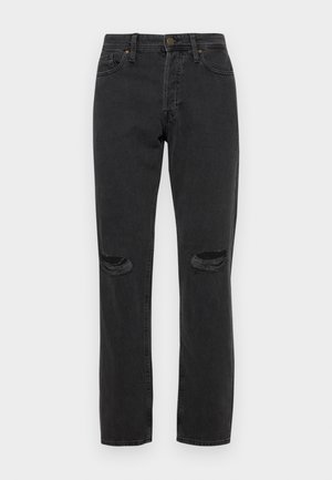 Črne denim hlače z obrabljenimi podrobnostmi na kolenih, pet-džepni dizajn, ravna silhueta in subtilen kontrast pri šivanju.