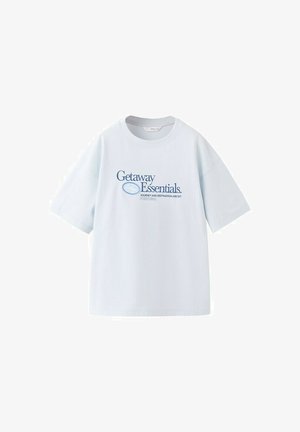 Light blue short-sleeve T-shirt with "Getaway Essentials" text and smaller text below reading "Journey and destination are set Portugal."