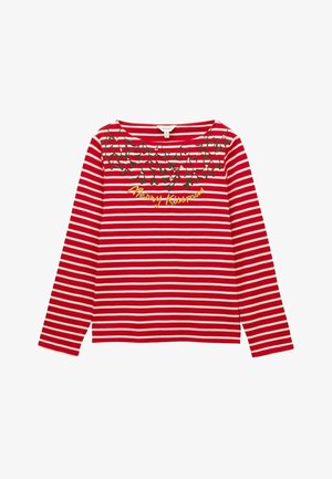 Raudonai ir balti dryžuoti ilgomis rankovėmis marškiniai, puošti žaliai siuvinėtomis papuošalais, su užrašu "Merry Kissmass" auksinėmis raidėmis per krūtinę.