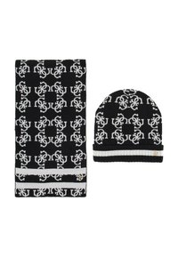Set di sciarpa e berretto a maglia in bianco e nero con un motivo ripetitivo, caratterizzato da una spessa striscia bianca sulla sciarpa e una cuffia piegata sul berretto.