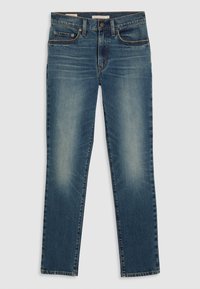 Jean en denim bleu avec des zones délavées sur les cuisses, fermeture à boutons à l'avant, passants de ceinture et design cinq poches sur fond uni.