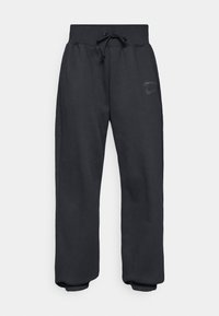 Sorte joggebukser med snor i livet og elastiske mansjetter. Har en subtil logo foran. Laget av myk, slitesterk stoff.