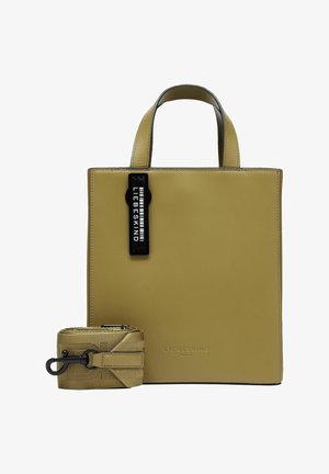 Borsa tote in pelle gialla con due manici corti, una tracolla staccabile e un'etichetta nera con il nome del marchio "LIEBESKIND" attaccata.