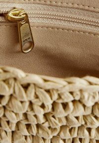 Next FABRICATION FRINGE  - Pikkulaukku - natural