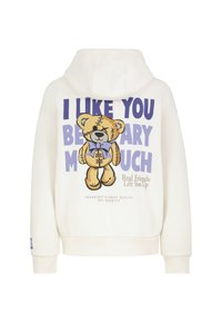 Witte hoodie met een afbeelding van een beer en tekst. De beer is gestikt en draagt een strik. De tekst bevat onder andere "I like you beary much."