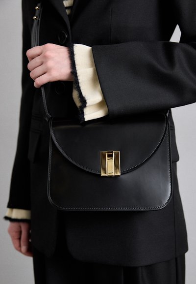 Bally OLLAM FLAP CROSSBODY - Geantă crossbody - black/yellow gold