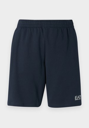 Navy blue elastic waistband shorts made from soft fabric, featuring side pockets and a small white EA7 logo on the lower left leg.