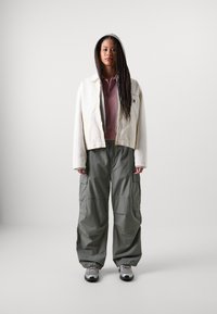 Carhartt WIP NORLINA - Polo - dusty fuchsia