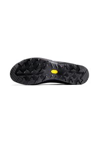 Schwarze Schuhsohle mit ausgeprägtem Profildesign, das kantige Stollen für besseren Grip aufweist. Vibram-Logo in Gelb nahe der Mitte. Flaches, strapazierfähiges Design.