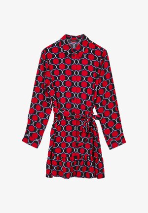 Rotes und schwarzes gemustertes Kleid mit langen Ärmeln, Kragen, Knopfleiste, gebundenem Taillenbund und gerafft geschnittenem Saum, der kreisförmige Designs in Weiß und Grau zeigt.