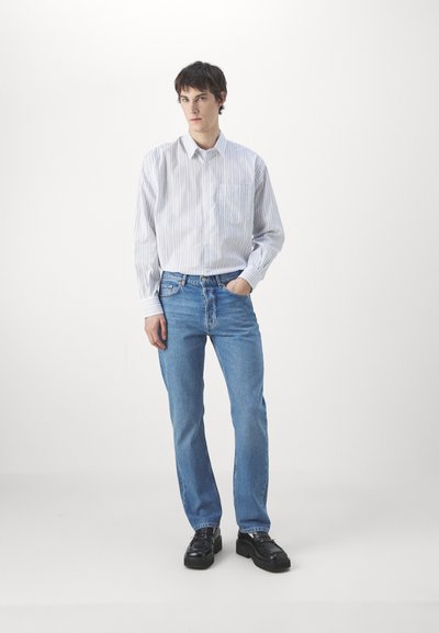 J.LINDEBERG CODY WASHED REGULAR  - Blugi drepți - light blue