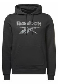 Sudadera con capucha negra hecha de una mezcla de algodón. Presenta un bolsillo tipo canguro en la parte frontal y un logo reflectante de Reebok en el pecho.