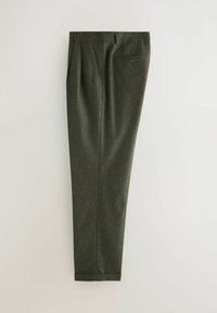 Grüne, strukturierten Hosen mit vorderen Falten und einer Gesäßtasche mit Knopfverschluss. Schmal zulaufendes Bein mit einem fertig genähten Saum.
