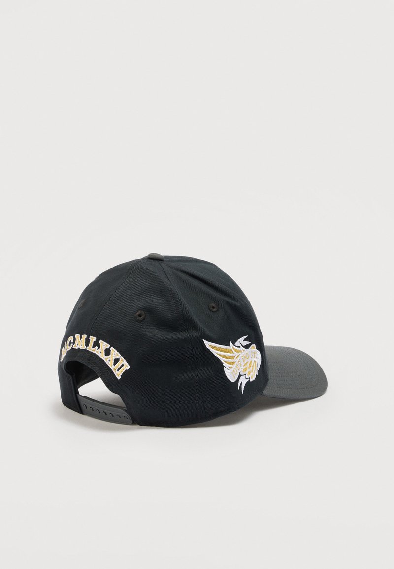 Black and gray baseball cap with adjustable strap, embroidered Roman numerals and winged emblem with "Just Do It" text on the sides.