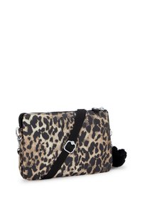 Leopard print crossbody bag with a zipper closure, black strap, silver hardware, and a black pom-pom accent. Fabric texture is smooth.