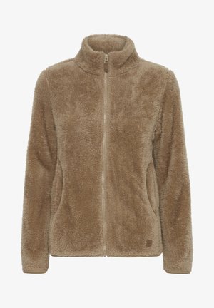 Chlupatá fleecová bunda na zip v béžové barvě s vysokým límcem, bočními kapsami a strukturovaným povrchem. Disponuje decentním logem na lemu.