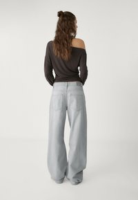 Stradivarius ASYMMETRICAL  - Top dugih rukava - dark brown