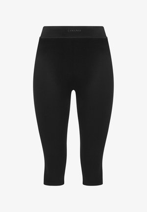 Mustad capri retuus, mis on valmistatud venivast kangast, sujuva vöökoha ja diskreetse soonilise tekstuuriga mugavuse ja paindlikkuse tagamiseks.