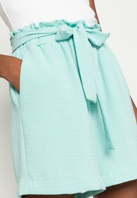 ONLY ONLMETTE PAPERBAG - Calções - pastel turquoise