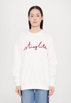 White sweatshirt with red cursive "stieglitz" lettering, soft cotton fabric, relaxed fit, round neck, and ribbed cuffs and hem.