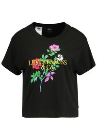 Czarna bawełniana koszulka z kolorowym haftem kwiatowym oraz napisem "LEVI STRAUSS & CO." w kolorze żółtym. Luźny, skrócony krój z okrągłym dekoltem.