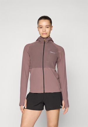 Lightweight, hooded jacket in mauve with a zip front, contrasting panel, and a chest pocket. Features long sleeves and thumbholes.