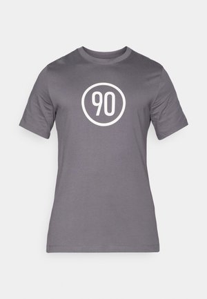 Gray T-shirt made from cotton, featuring a round white graphic with the number "90" in the center. Short sleeves and crew neck design.