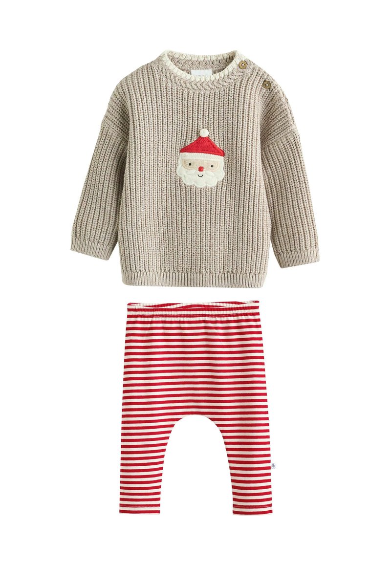 Heled hallides kudumissweater, kus on Santa näo detail ja valge krae; punasest ja valgest triibulisest kangast legginsid elastse vöökohtaga.