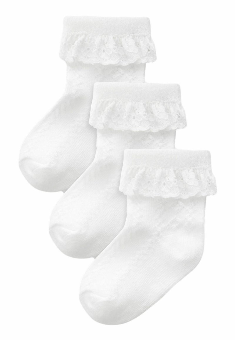 Weiße Baumwollsocken für Kleinkinder mit einer Rüschenspitze am oberen Rand und einem strukturierten Design über den gesamten Körper. Set mit drei Paaren.