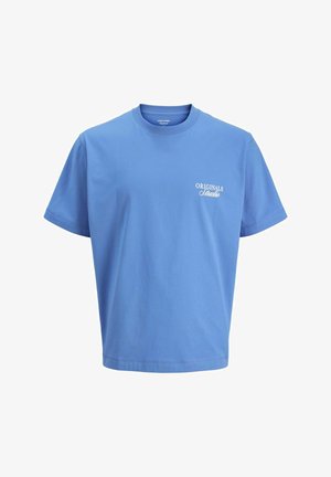 Heledu sinine puuvillane t-särk ümarate kraega ja lühikeste varrukatega. Rinnal on valge print "ORIGINALS Studio". Klassikaline lõige.