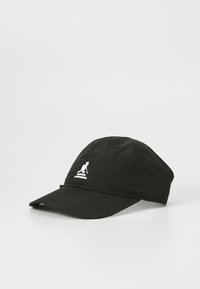 Black cap made of fabric with a rounded crown, curved brim, and a white logo detail featuring a kangaroo and brand name.