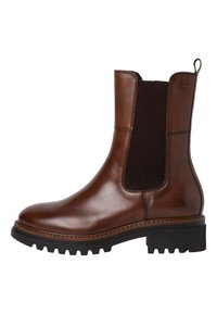 Brun läder Chelsea boot med svart elastisk sidopanel, dragflik bak och kraftig svart gummisula med djupa spår.
