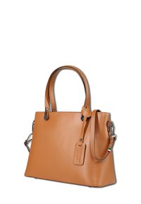 Tan leather handbag with dual handles, detachable shoulder strap, and a leather tag attached near one handle.