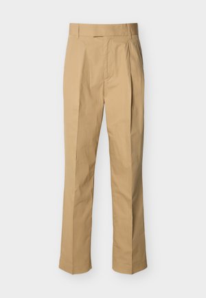 Beige Hosen aus glatter Baumwolle mit hoher Taille, vorne mit Falten und geraden Beinen. Keine sichtbaren Beschläge oder Muster.