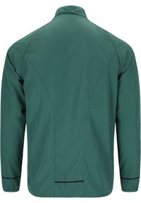 Veste vert foncé à manches longues avec col montant, bordure réfléchissante noire aux poignets et au bas du dos, vue de dos.