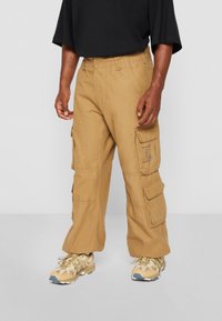 Brandit Cargobyxor - beige