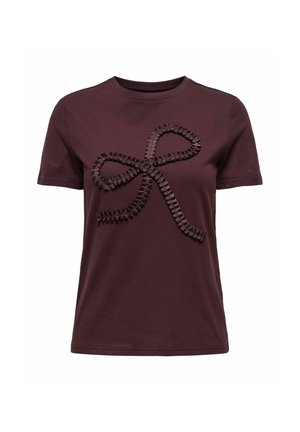 Ciemnofioletowa koszulka z krótkim rękawem z teksturowanym wzorem wstążki w kształcie kokardy na przodzie.