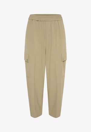 Pantalones cargo beige con cintura elástica, dos bolsillos laterales y piernas ajustadas. Fabricados con material suave y textura lisa.