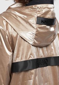 khujo Regenjas - beige